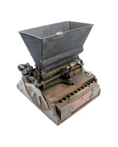 A 12 Guage Dixons Loading Machine
