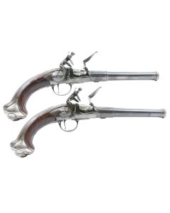 A Rare Pair Of 20-Bore Flintlock Silver-Mounted Two-Shot Superimposed-Load Breech-Loading Pistols